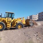 تسطیح و جمع آوری نخاله های کانال بهجت مهرشهر